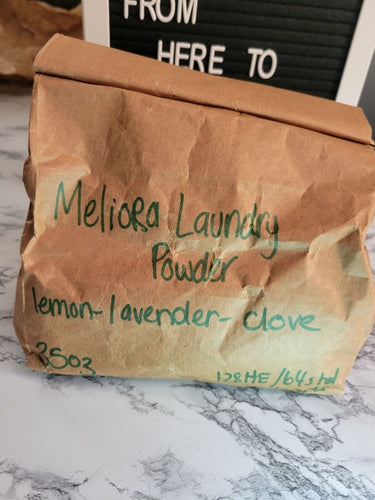 A paper bag REFILL of Meliora Laundry Powder in lemon lavender clove.