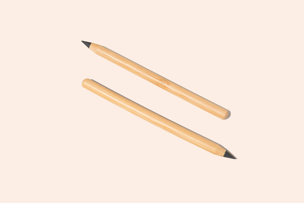 Photo of two never ending, no-waste, bamboo pencils side by side