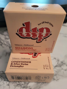 Dip shampoo and conditioner bars in driftwood and tobacco scent