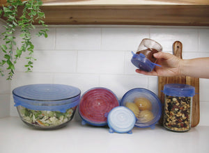 Different size bowl covers being used to cover bowls of a variety of sizes